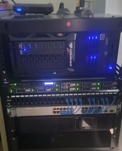 Self hosted 12U rack with personal PC in full tower case sideways. 1u power edge r430, 1u patch panel, 1u cisco gigabit switch and 1u 1500va UPS